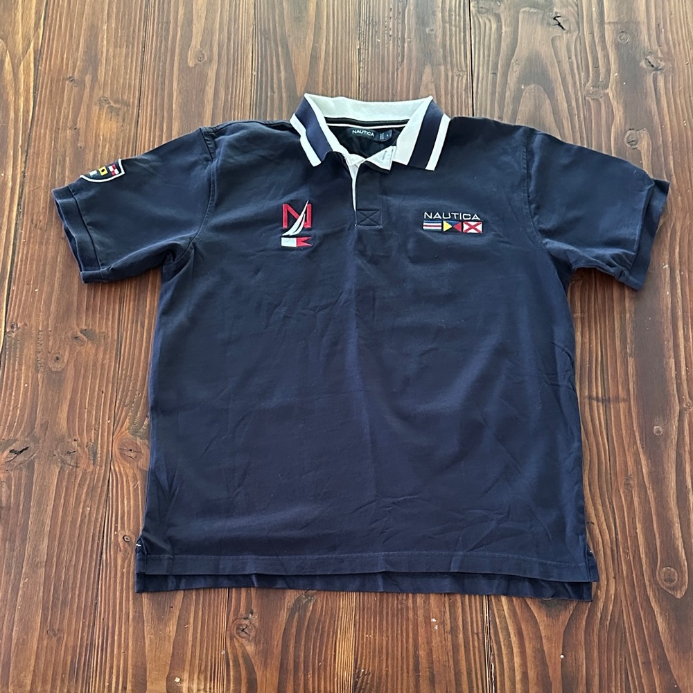 Nautica men’s  Polo Shirt in Navy with Embroidered Accents
